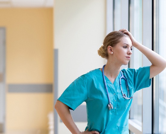 Photo of a nurse looking anxious